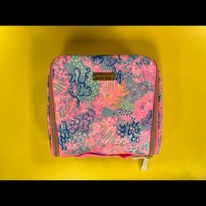 Lilly Pulitzer Travel Case does not include travel bottles. Used twice.